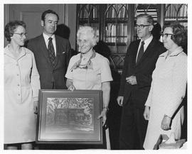 Photograph of the presentation of a picture to Mrs. Stoker