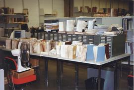 Photograph of damaged books drying on a table