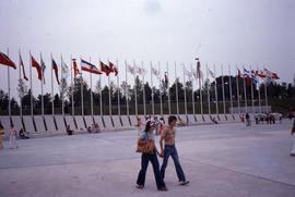 Photograph of the flags in the plaza outside the stadium