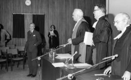 Photograph of unidentified people at a law award presentation