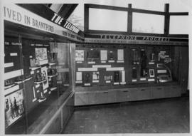 Photograph of a telephone display behind glass