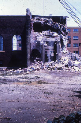 Photograph of demolition of Medical-Dental Library, broken wall