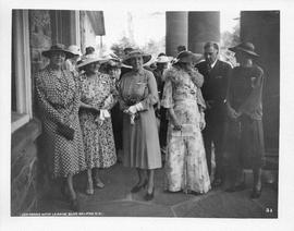 Photograph of Mrs. J. MacG. Stewart, Mrs. Johnstone, and others in front of Shirreff Hall