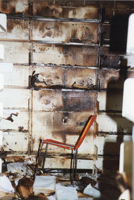 Photograph of fire damaged shelves in the Killam Library