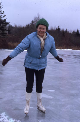 Photograph of Barbara Hinds skating on a pond