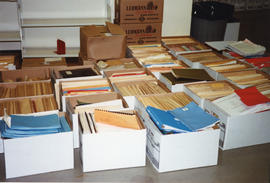 Photograph of boxes of files and binders rescued during the fire at the 1998 Killam Library