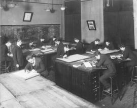 Photograph of a machine drawing class