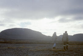 Photograph of Barbara Hinds and Allie walking in Cape Dorset, Northwest Territories