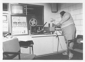 Photograph of an unidentified person in a television studio