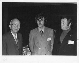 Photograph of Ian Campbell, Brian Smith, and an unidentified person
