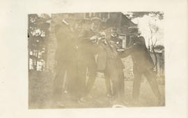 Postcard with a photograph of six unidentified people at a Dalhousie reunion