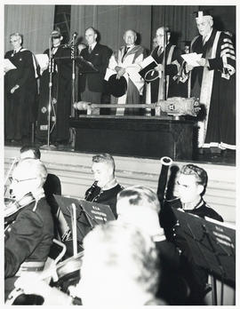 Photograph of ceremony with a band playing