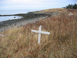 Photograph of two white crosses on the beach at Whites Point, Digby Neck, Nova Scotia
