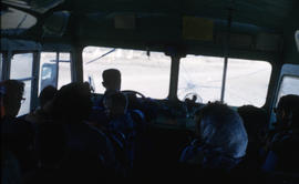 Photograph of several people on a bus near Frobisher Bay, Northwest Territories