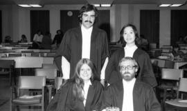 Photograph of four law students at an award presentation