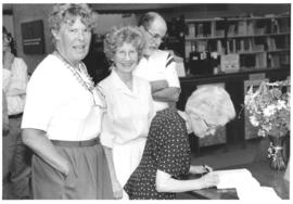 Photograph of guests at Bill Owen's W.K. Kellogg Library retirement party