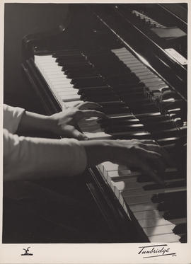 Publicity photograph of Ellen Ballon's hands on a keyboard