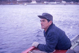 Photograph of a man on a boat in Postville, Newfoundland and Labrador