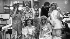 Photograph of circulation staff in costume