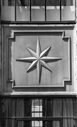 Photograph of a metal star on a building