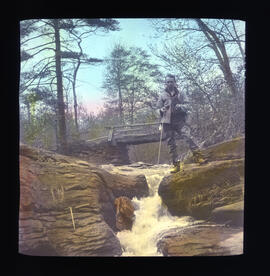 Photograph of unidentified man with fishing rod
