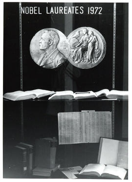 Photograph of display case exhibit of Nobel Laureates