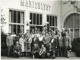 Photograph of a touring group, including Edith and Thomas Head Raddall, at the Marienlyst Hotel E...