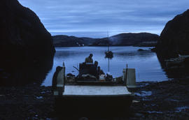 Photograph of a boat on the shore in Port Burwell, Northwest Territories