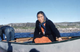 Photograph of an unidentified woman in a canoe in Fort Chimo, Quebec