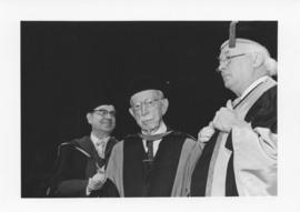Photograph of Henry Hicks, Dr. A. J. Tingley, and Dr. Mackenzie at a convocation ceremony