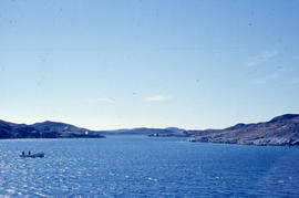 Photograph of a small boat on the water near Newfoundland and Labrador
