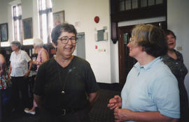 Photograph of an unidentified person and Rosemary Mackenzie, Science Librarian, in University Hall