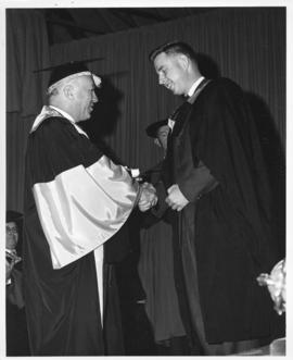 Photograph of Henry Hicks conferring a degree on Arthur McDonald