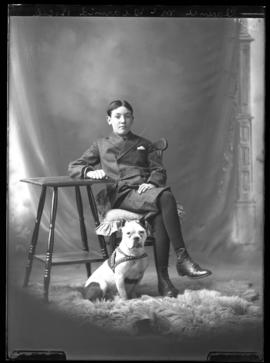 Photograph of Clarence Hoyt McDearmid and a dog