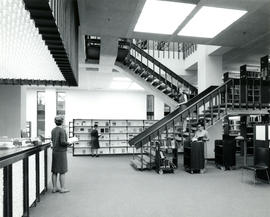 Photograph of the Circulation Desk and staircase in the W.K. Kellogg Library