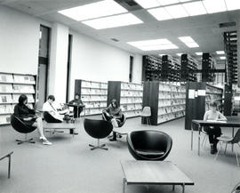 Photograph of the first floor stacks and reading room in the W.K. Kellogg Library