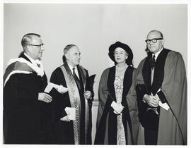 Photograph of A.E. Kerr with faculty members at convocation