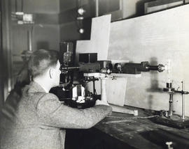 Photograph of man using laboratory equipment in the Science Building