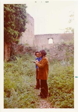 Photograph of two men in Castello dell Abate by P. Dohrn