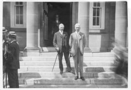 Photograph of G. S. Campbell and A. S. MacKenzie on the front steps of the Macdonald Library