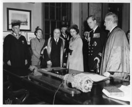 Photograph of Princess Elizabeth, the Duke of Edinburgh, and others in the Macdonald Memorial Lib...