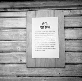 Photograph of a sign at a post office in Dawson City, Yukon
