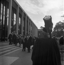 Photograph of the Dalhousie mace being carried to the Dalhousie medical centennial convocation ce...