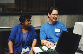 Photograph of James Boxall demonstrating the Libraries' electronic services and products at the K...