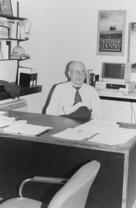 Photograph of Dr. William Birdsall, University Librarian, in Killam Library administration office