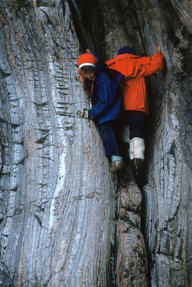 Photograph of two people rock climbing in Cape Dorset, Northwest Territories