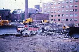 Photograph of demolition of Medical-Dental Library, removing rubble