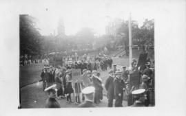 Postcard with a photograph of an alumni procession on the Grand Parade