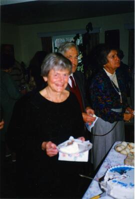 Photograph of Elisabeth Mann Borgese eating birthday cake