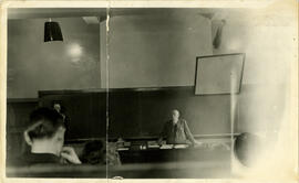 Photograph of George A. Burbidge in a medical sciences classroom
